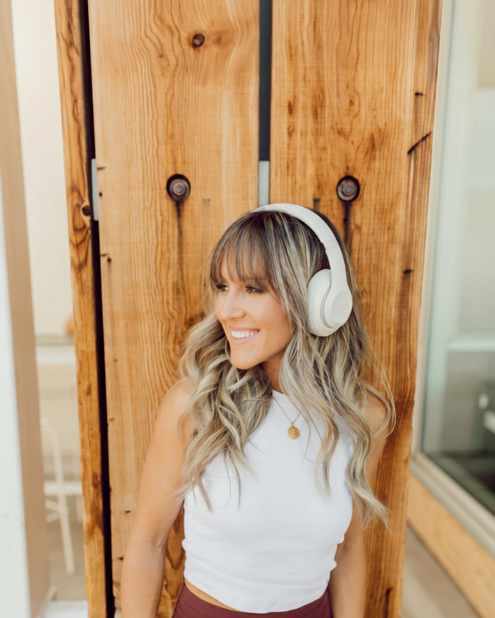 Feature Image with Sammy wearing headphones for episode 38 of the simply wellness radio show.